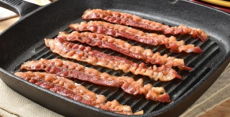 can you leave bacon grease in a cast iron skillet