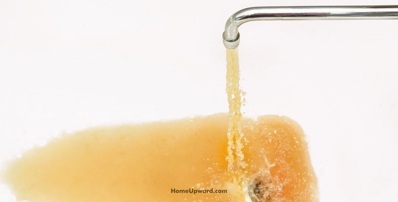 what causes brown tap water